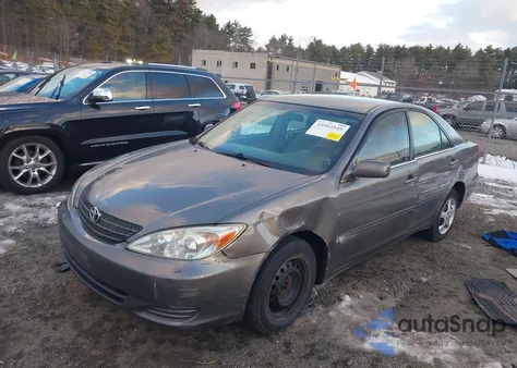 2003 Toyota Camry Le z USA, uszkodzony, nr VIN 4T1BE32K13U682017